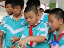以吹乒乓球过易拉罐为主题的技巧分享（轻松学会用吹气的方式将乒乓球过易拉罐）